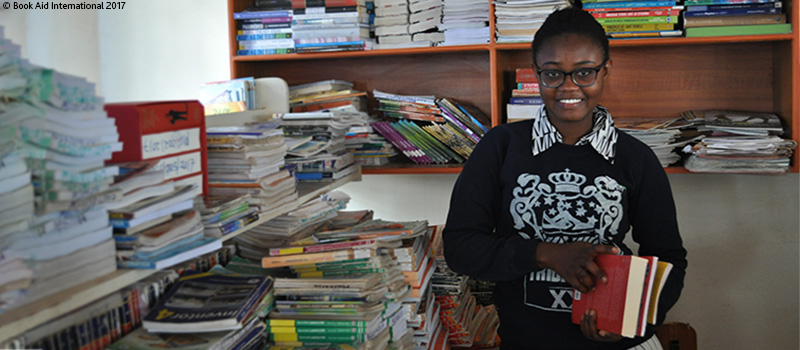 Yvonne from a Kenyan refugee camp with books