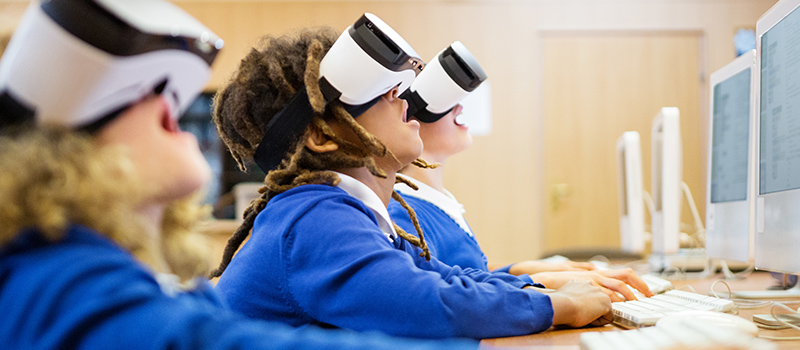 Students using virtual reality goggles