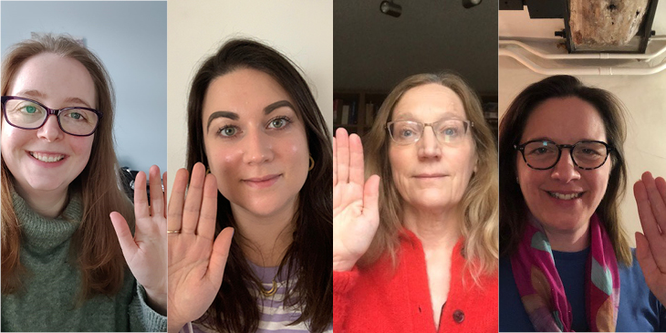 Members of Cambridge Assessment's Women in Leadership staff network raising their hands in the choose to challenge pose for International Women's Day