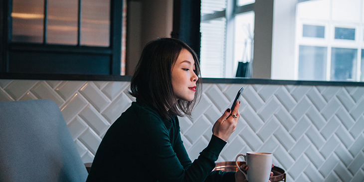 Woman looking at her mobile phone