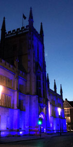 200 year old Pitt Building on Silver Street in Cambridge lit up in blue lights