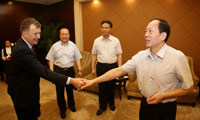 Michael shaking hands China June 2015 - image