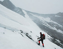 Tim climbing mountain