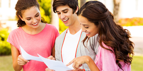 Students happily discuss results