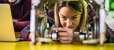 girl adjusting machine