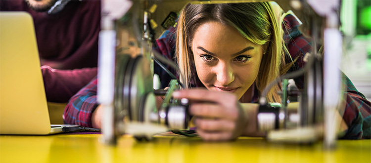 girl adjusting machine