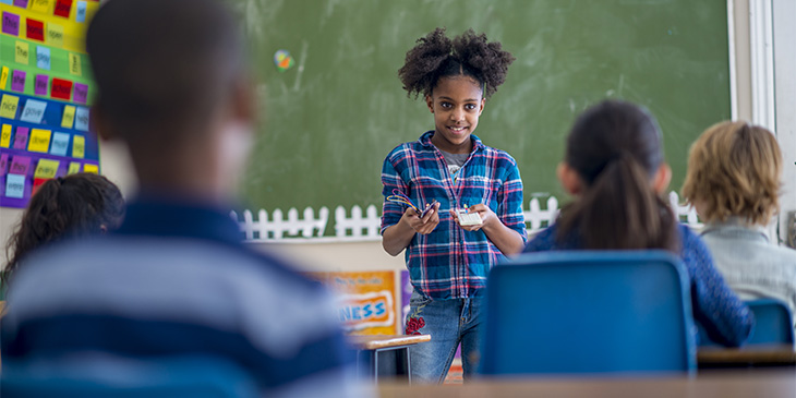 Girl speaking in class