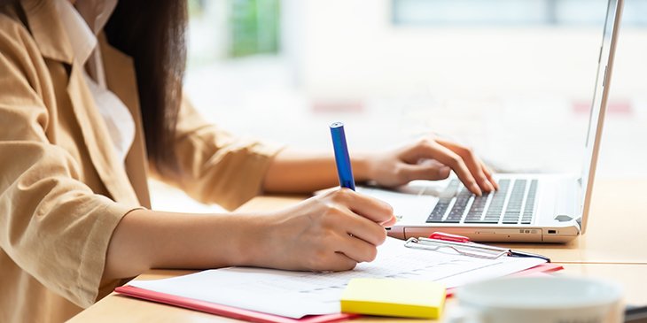 Woman working at a laptop