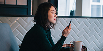 Woman looking at her mobile phone