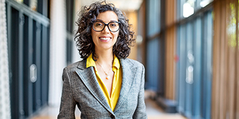 Professionally dressed woman looking confident