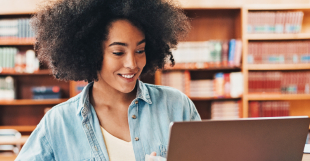 Girl working at a laptop