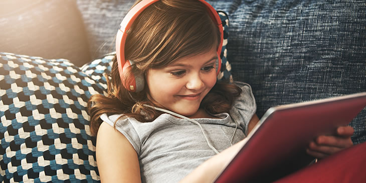 young learner playing video game